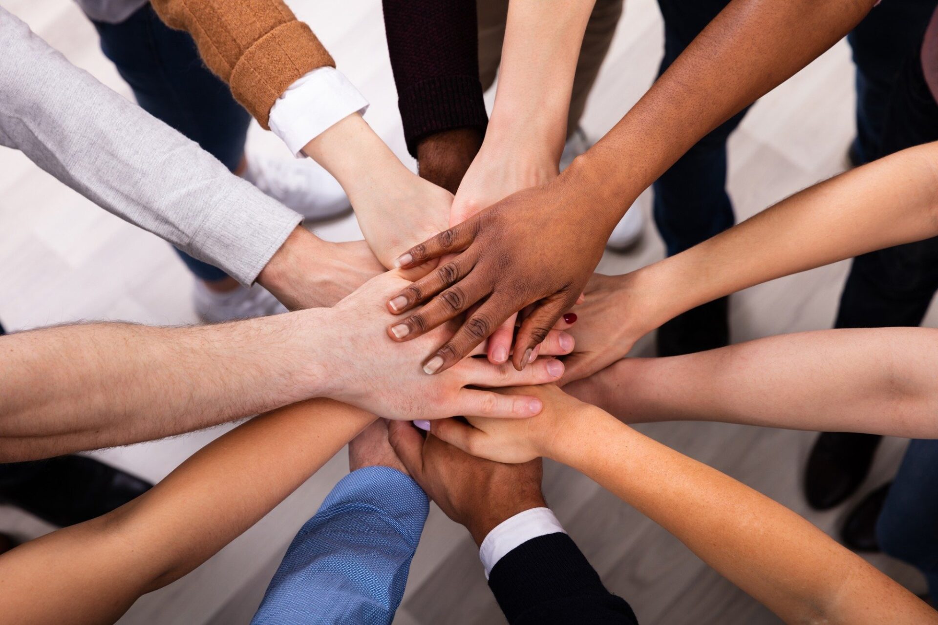 2000x1333 diverse people stacking hand together picture id1152125129